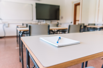 notebook on classroom table
