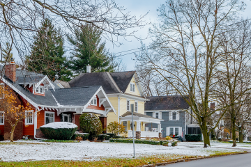 Row of Single Family Homes on Residential Street in Western New York During Early Winter
