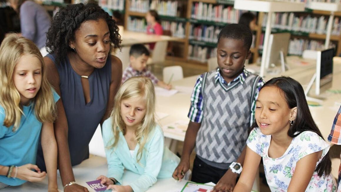 Children in classroom with teacher