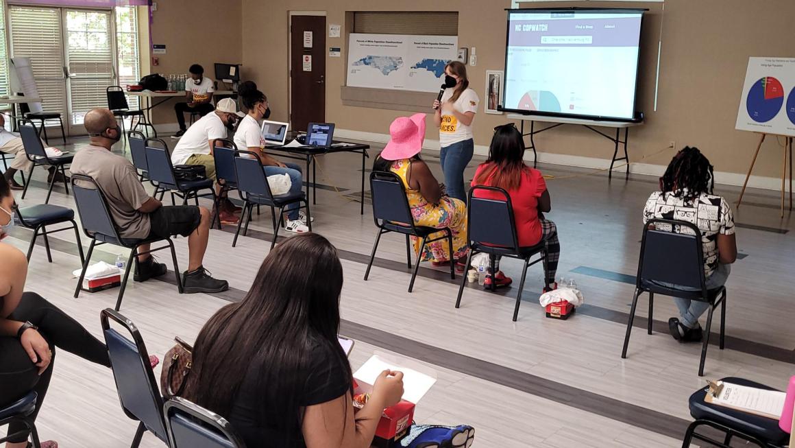A Forward Justice representative leading a presentation