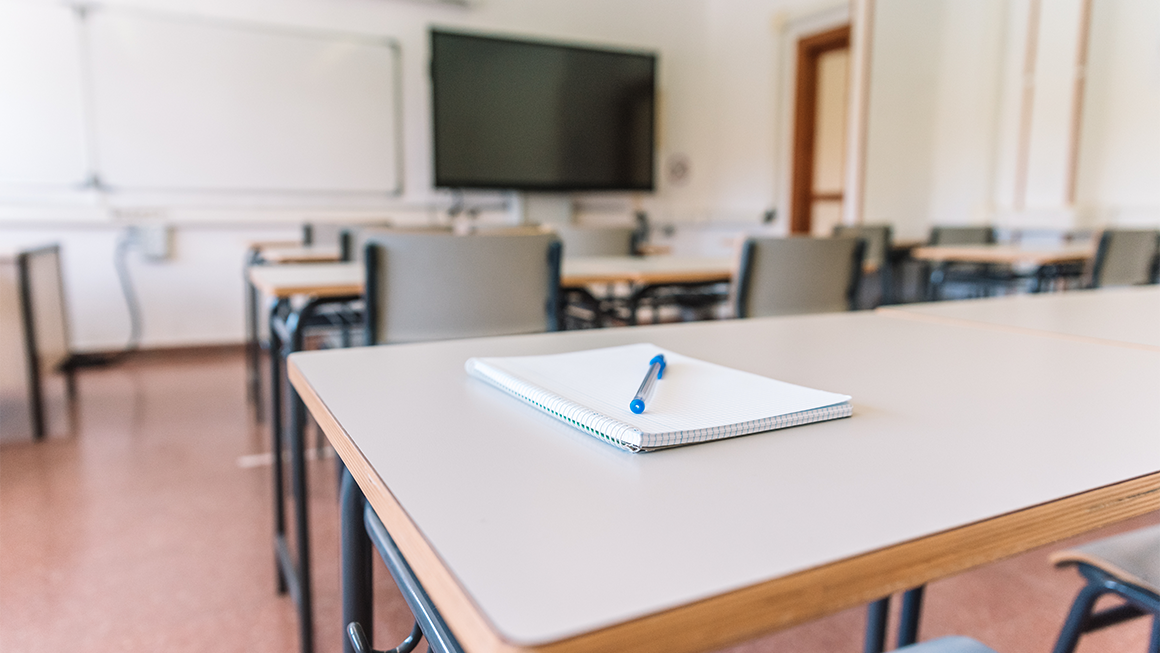 notebook on classroom table