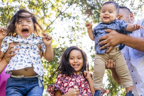 A family plays outside