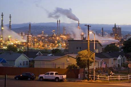 Residential houses next to oil refinery