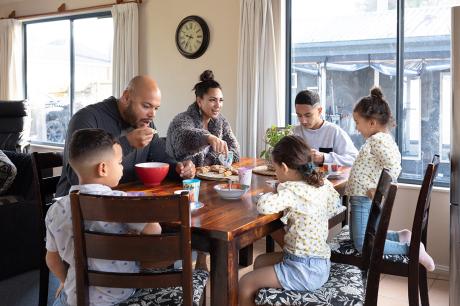 A family gathered around a dinner table.