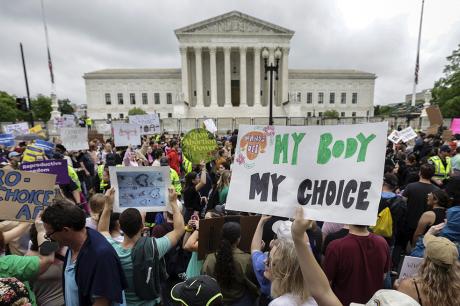 Abortion rights activists participate in a Bans Off Our Bodies rally at the U.S. Supreme Court on May 14, 2022 in Washington, DC.