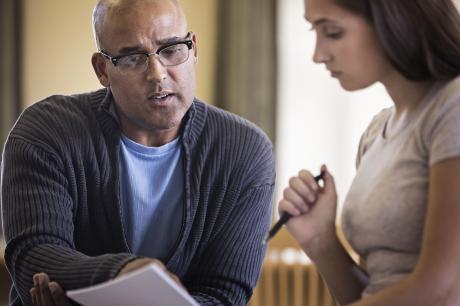 Colleagues reviewing a file