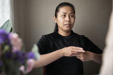 Woman signing with hands