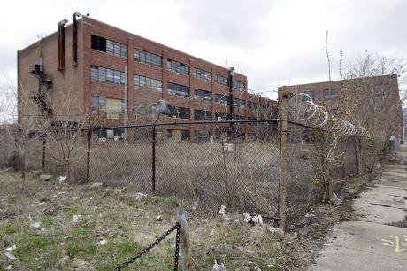 A vacant warehouse is shown in Detroit