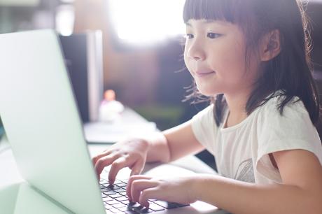Child using a laptop