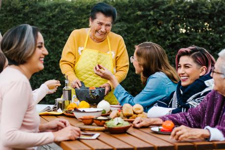 Group of people around a table. 