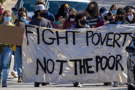 Protesters march in the middle of 17th Street on the way to Assembly Hall.