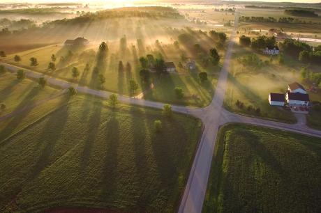 An aerial shot of a rural neighborhood. 