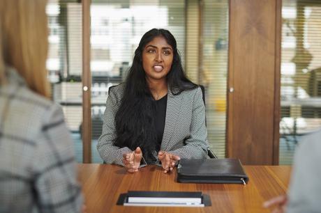 A woman interviewing for a job.