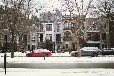 A row of homes during winter.