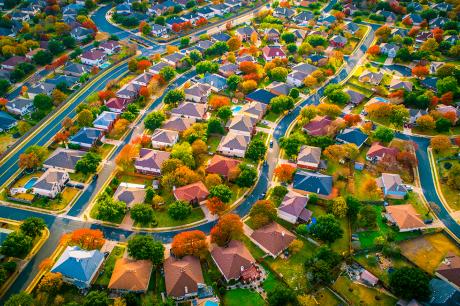 An aerial shot of a suburban neighborhood.