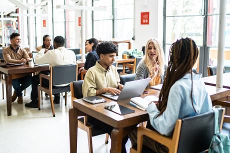 Students working at a desk.