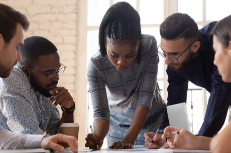 photo of different people working together