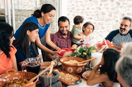 A large family around a dinner table.