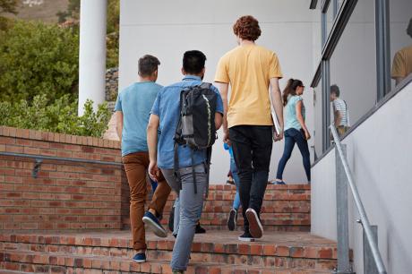 photo of students walking up stairs