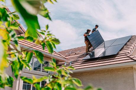 photo of solar panel on roof of house