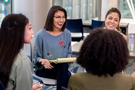 photo of people sitting together in a meeting