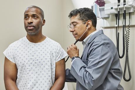 photo of doctor with patient