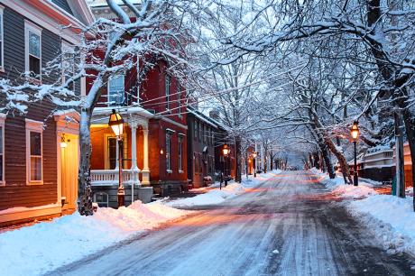photo of snowy road and house