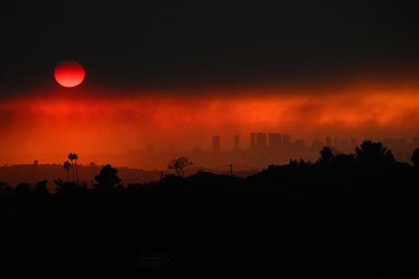 An aerial image shows smoke from wildfires including the Eaton Fire and Palisades Fire in Los Angeles, California, on January 8, 2025.