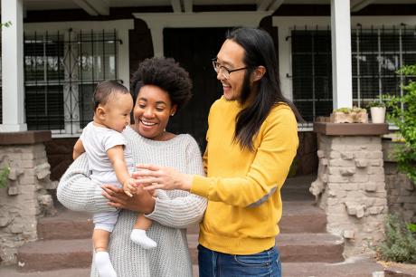 Happy diverse family spending time together at the porch