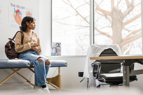 A woman waiting in a doctor's office