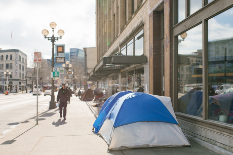 A tent in a city street.