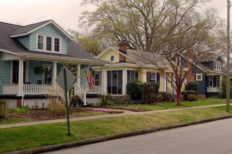 A row of residential single family homes. 