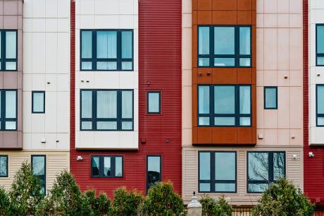 Photo of colorful multi-family housing. 