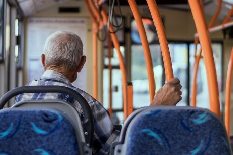 Man rides a bus