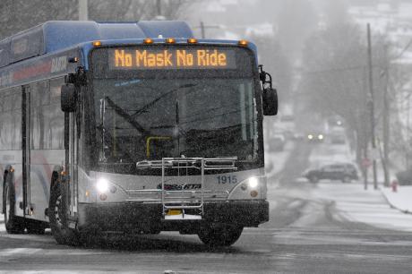A bus message reads "No Mask No Ride"