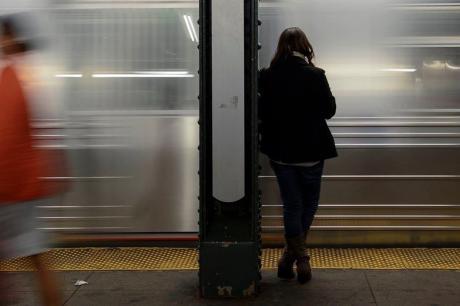 Person waits for the subway