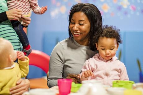 Mother plays with her child