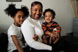 A mother and her two children.