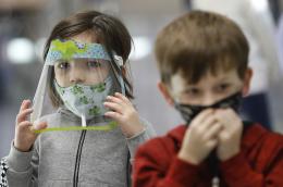 Kids wear masks and face shields 