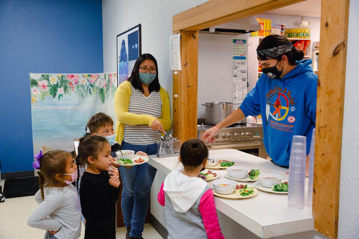  Students of the Wakanyeja Tokeyahci Lakota Immersion School are served a lunch
