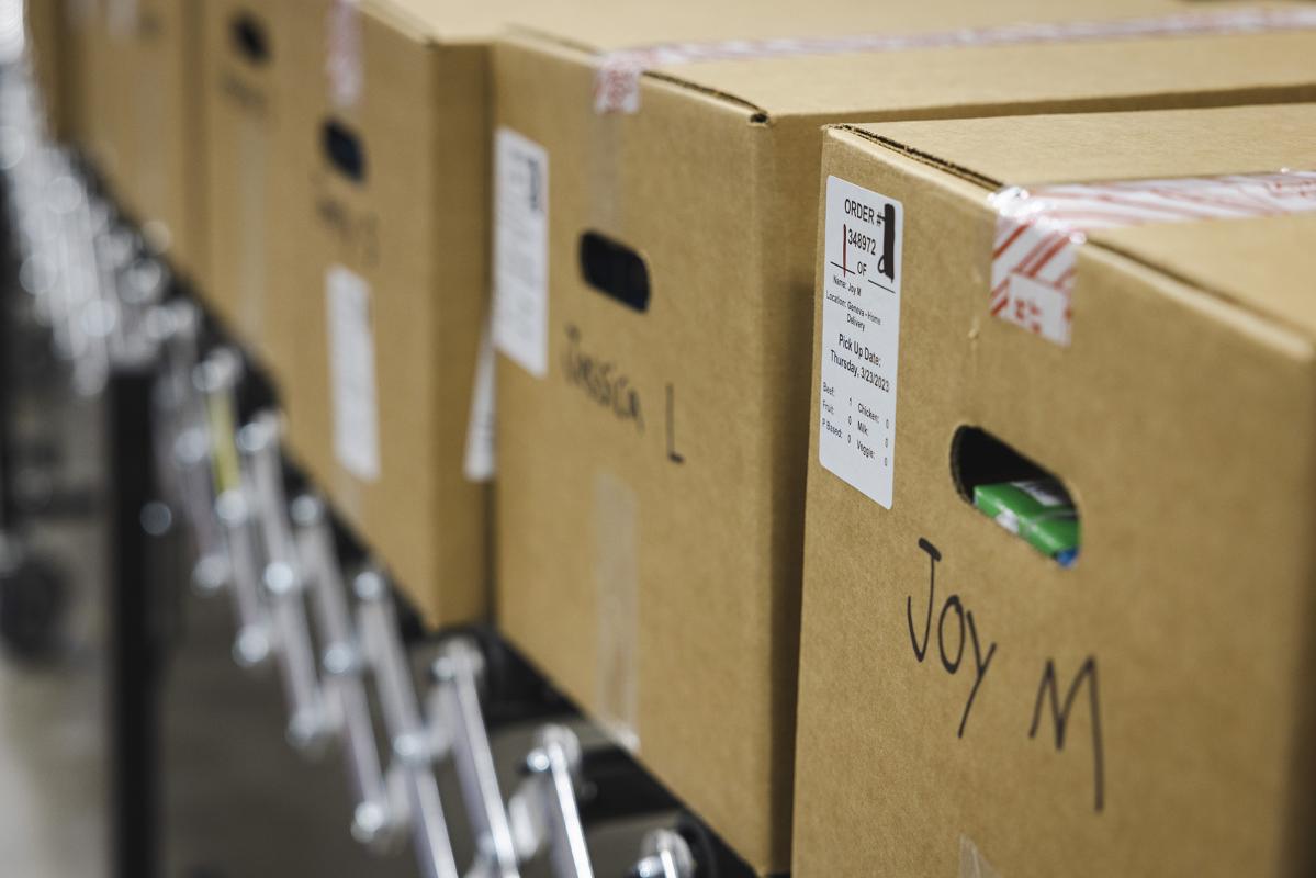Sealed food packages marked with participants’ names.