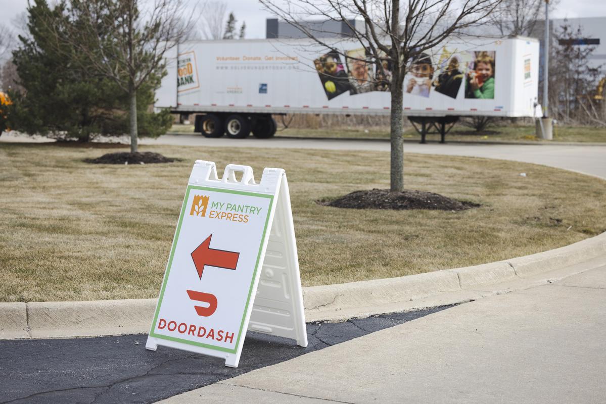 The pickup area and directional signs for DoorDash deliveries.