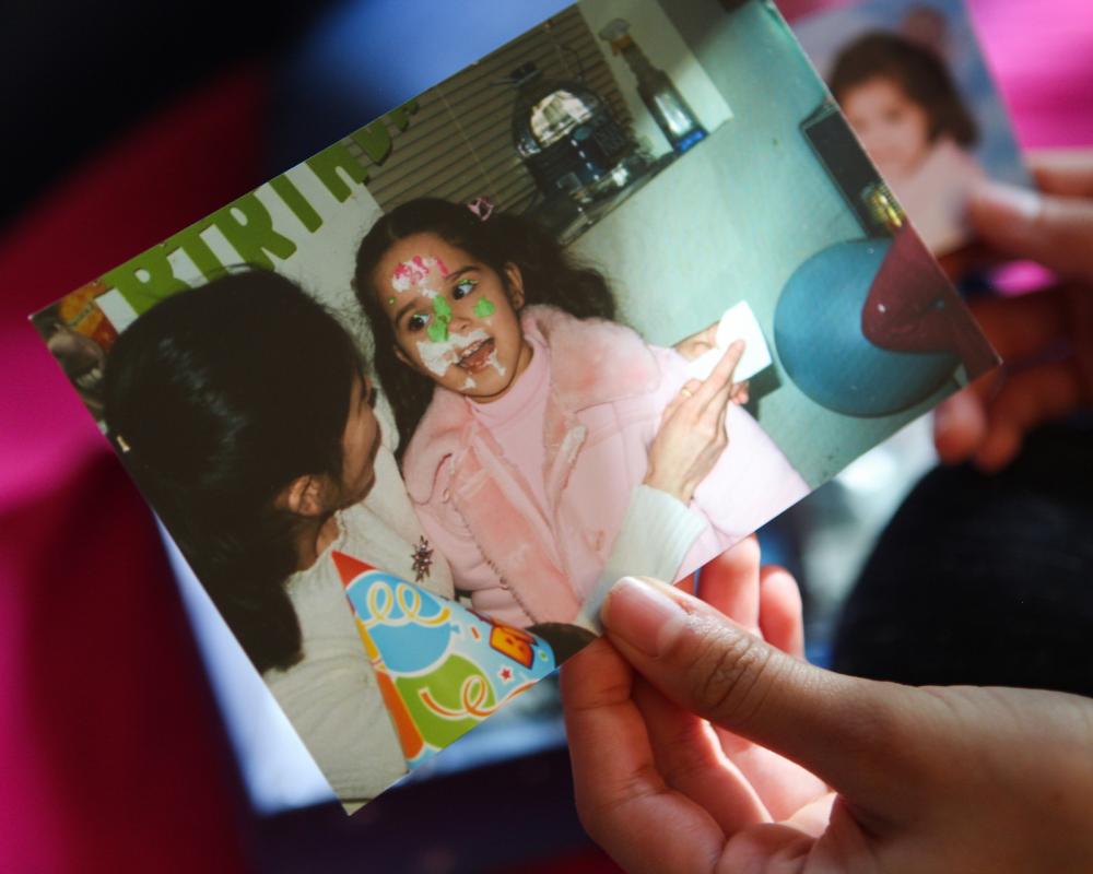 A photo of Coral Castro and her daughter, Diana, when Diana was a toddler. Coral regrets the time she missed with Diana in those early years when she was balancing work and school. 
